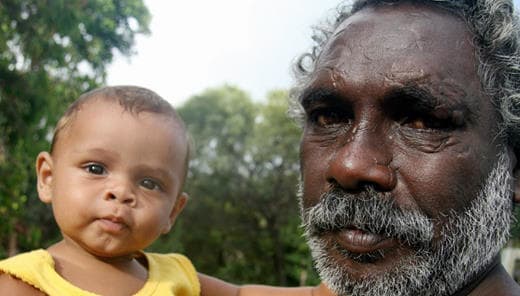 I nodded holding tightly a small Australian flag but he smiled and put an Aboriginal flag into my other hand.