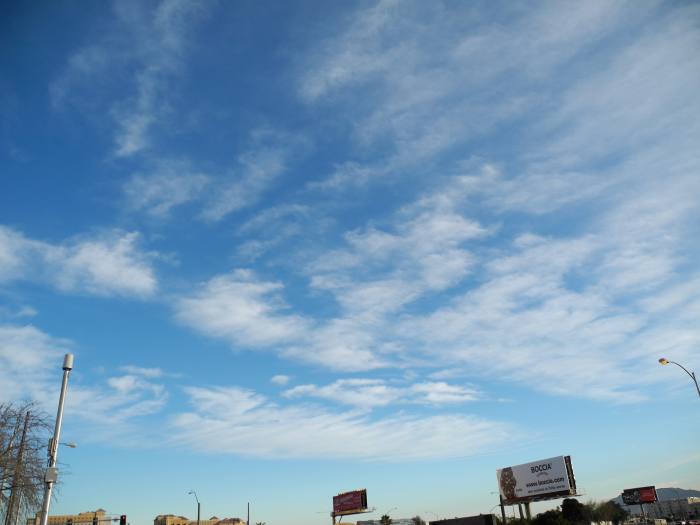 Winds carry the chemicals, gradually the clouds shape into smaller cloud-like formations. (Swiss Cheese, compared to Cottage Cheese) called a Keyhole Punch Cloud. But the air quality and dryness, still cause you to gasp for air. (((NOT a cloud!!!