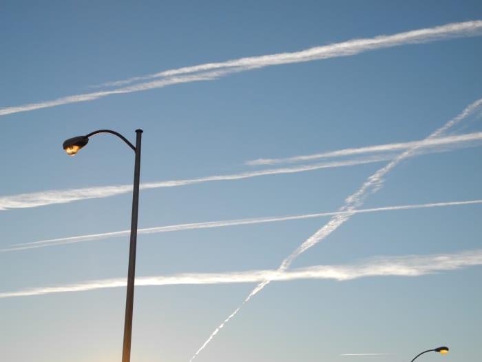(Phase 2) The Pencil Thin Lines begin to morph quickly into wider streams of Chemtrails... similar to how one of those thin sponges starts expanding when exposed to water... it continues to grow- and morph into a much LARGER Cloud Formation.