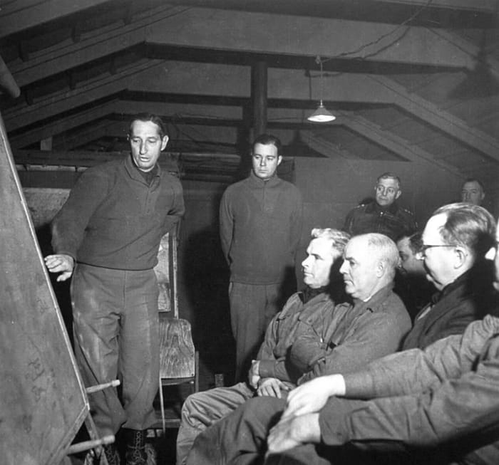 Clark speaks with reporters. General Truscott is in the back (leather jacket). Even Clark's relationship with the press corps became strained.