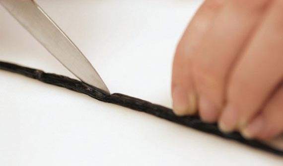 Take the tip of your paring knife and run it lengthwise down the vanilla bean exposing the tiny seeds inside.