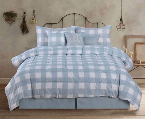 Farmhouse is in the country bedroom with the buffalo check soft blue-gray and the pretty toss pillows. .