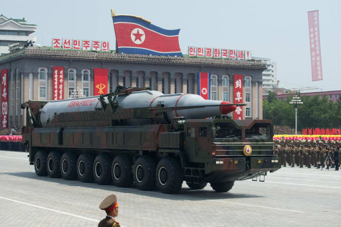 Is it delusional to invest in developing nuclear weapons while the population starves, or is it an investment for future generations?