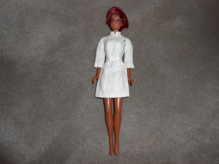 This was the first Barbie doll that I sold on eBay and she went for $24.99. It's a Julia Barbie doll. from the 1960s sitcom of the very same name, starring Diahnn Carroll.