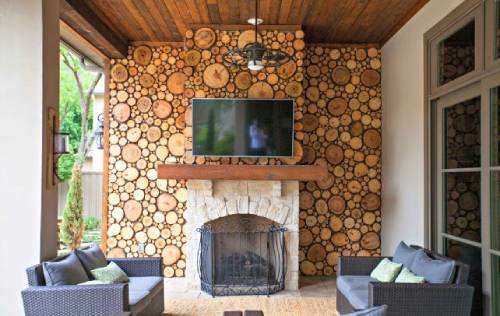 Fill in gaps with smaller wood slices or pieces as desired. The wood slices on the wall and above the fireplace patio outside.