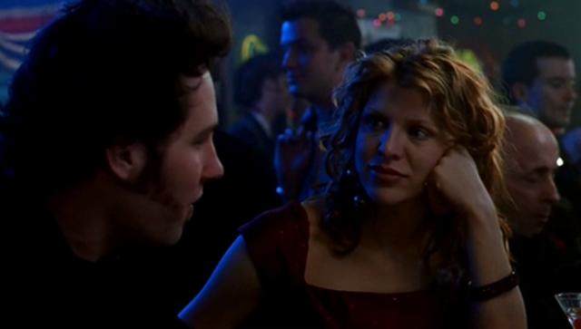Kevin (Paul Rudd) explains to Lucy (Courtney Love) why New Year's Eve is depressing in 200 Cigarettes