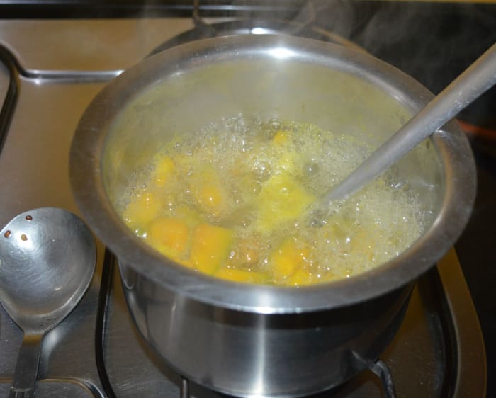 Allow the mixture to boil. After 2 minutes, reduce the heat and cover the vessel. This process quickens cooking. Cook for 5 minutes.
