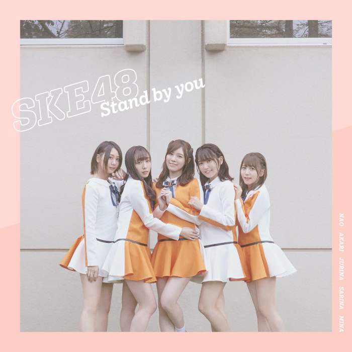 This is a look at one of the covers for the song Stand by You. It is the regular edition for Type A. Jurina Matsui is at the center of the picture.