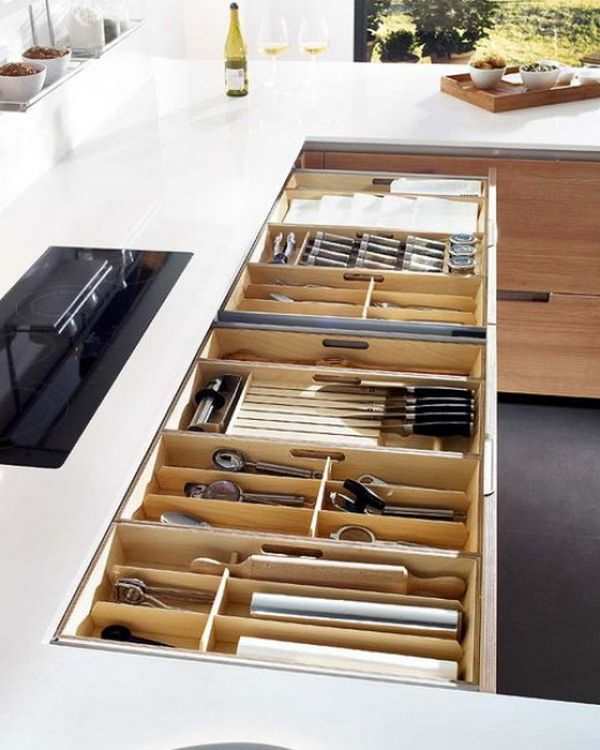 Neat organized kitchen drawers for knives, spoons and other similar utensils. The drawer organizers are definitely with that.