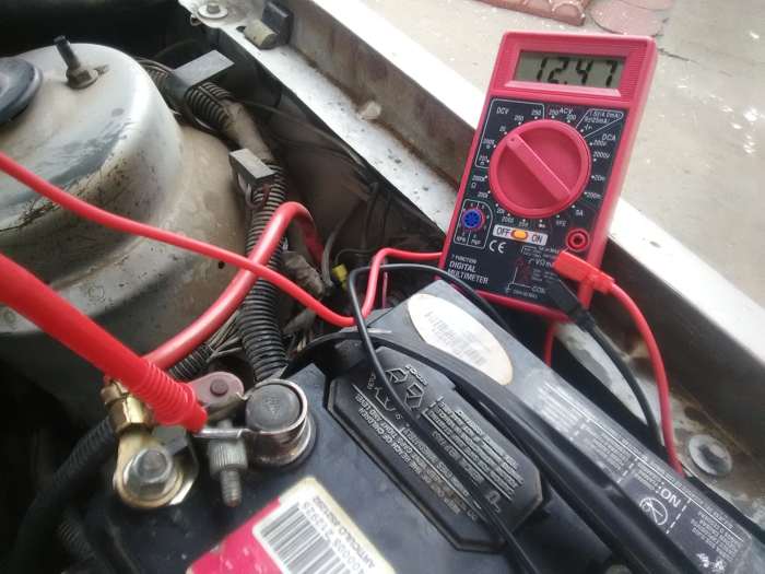Use your digital multimeter (DMM) to check battery's open circuit voltage and charging voltage with engine at idle.