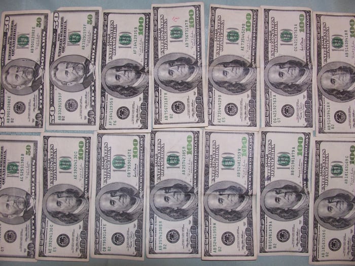 Positions which require working with large amounts of money generally require credit checks AND background checks.