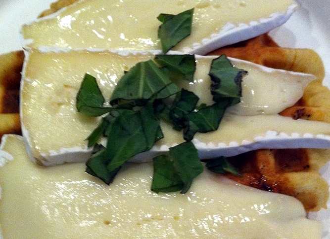 Brie is a soft cheese with a flavor that is slightly reminiscent of butter.