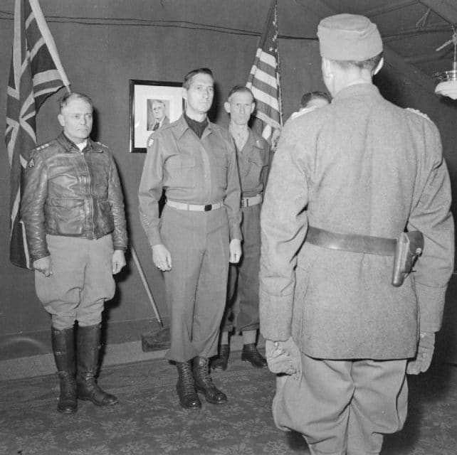 It's over - Lt. General Fridolin von Senger und Etterlin, the commander of XIV Panzer Corps, meets Clark, Lieutenant General Sir Richard McCreery and Truscott. at 15th Army Group Headquarters,