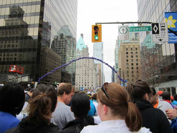 Reflections at the start of the Vancouver Sun Run, with the green roof of the Hotel Vancouver in the background