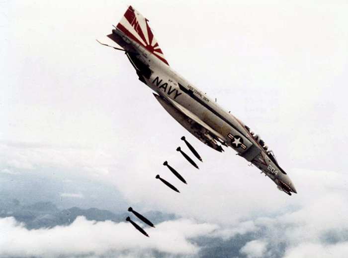 An American F-48 VF111 bomber in Vietnam. Chief of Staff of the United States Air Force Curtis LeMay stated that "we're going to bomb them back into the Stone Age".