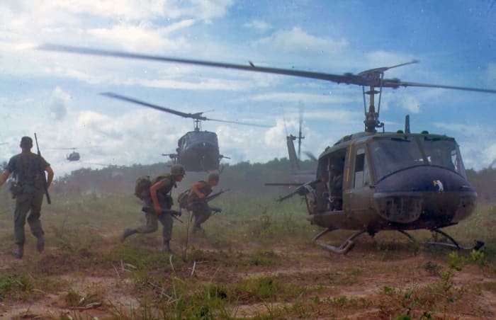American helicopters airlift members of a U.S. infantry regiment in 1966. The war in Vietnam would be the first war where helicopters would become the main source of transportation for combat troops.