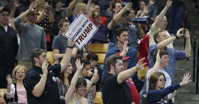 Trump's Followers raising their hands pledging to vote for Trump.. Looked like a German salute of the Third Reich..