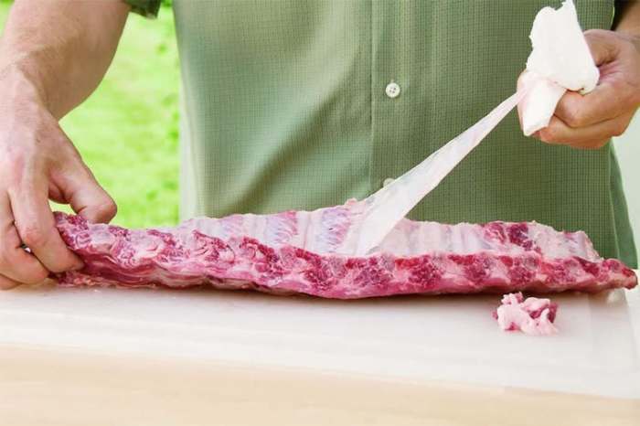 The membrane, the membrane is the thin clear thin light cream-colored skin that is on the backside of your rib, now some people keep it on but like to remove it because it gives me an even more tender piece of meat.