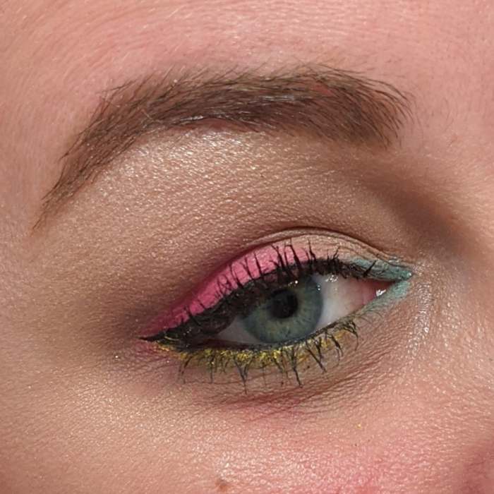 Combining different shades of eyeshadow and eyeliner will help you pump up your neon makeup look even more!