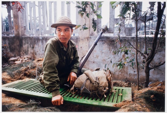 North Vietnamese soldier sitting on top of his foxhole waiting for the U.S. Marines to walk into his ambush.