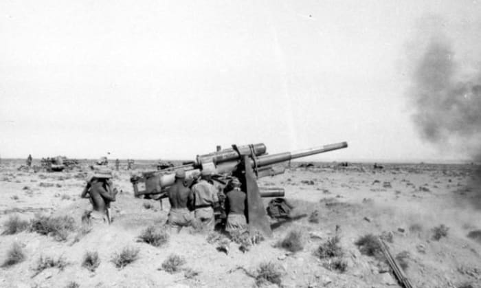 88mm Flak 18 guns fire upon British armor they would prove one of the most effective tank killers of the Second World War