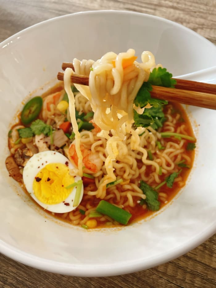 The ramen is definitely not boring; it's absolutely delicious! The broth is spicy, just the way I like it. Yum!