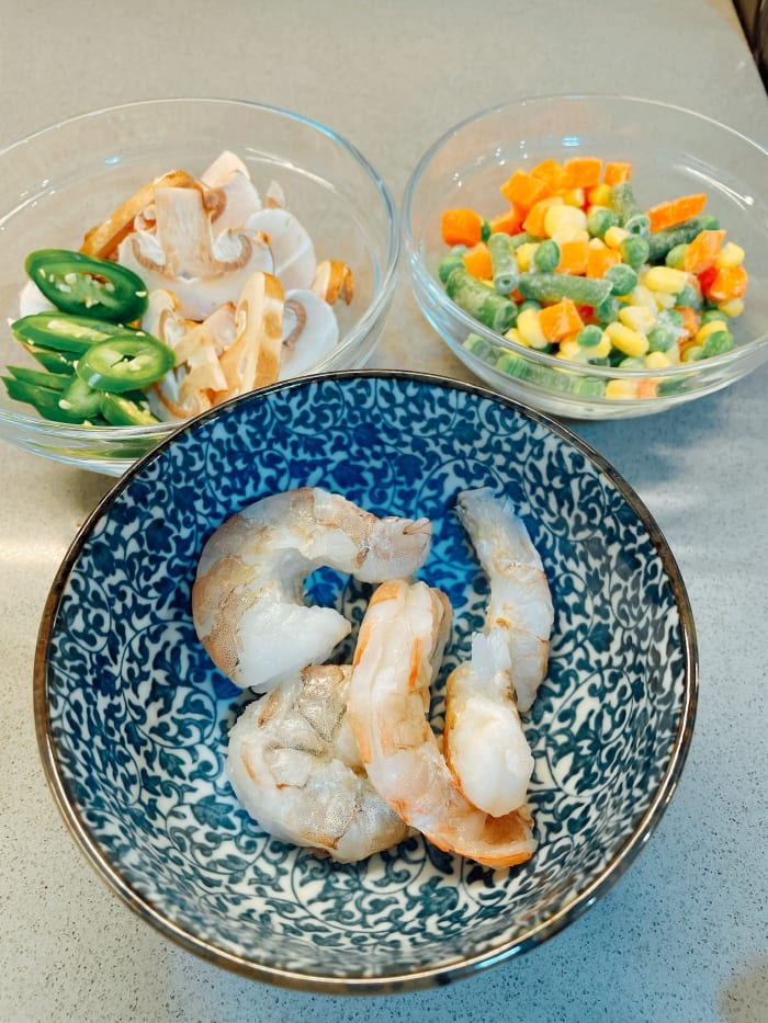 If you don't like shrimp, you can substitute chicken. I use frozen mixed vegetables. I also add sliced mushroom and serrano peppers.