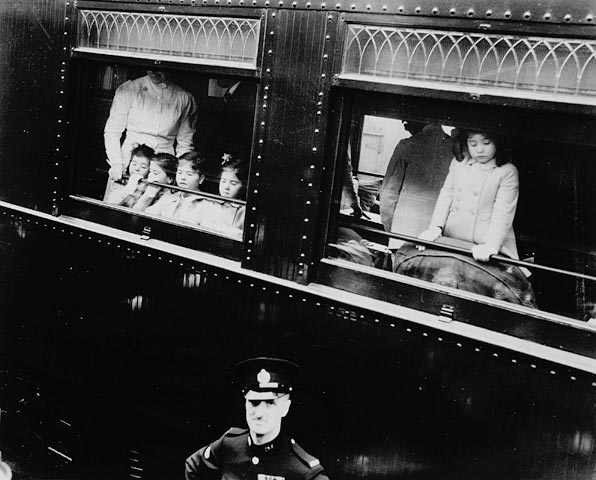The Dionne Quintuplets arrive in Toronto for presentation to Her Majesty Queen Elizabeth. Toronto, Canada.