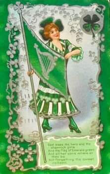 The Shamrock is often confused with the four-leaf clover. This image of the Shamrock girl, bears the Lucky Clover in the top right hand corner of the picture.