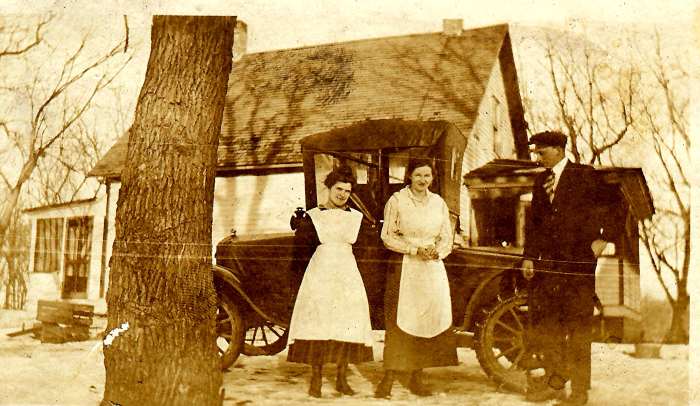 This car might have been similar to the one mentioned in this story. In the photo are my husband's grandparents plus another person in the middle.