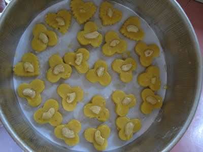 You need not space the cookies out since they will not spread out when baking.