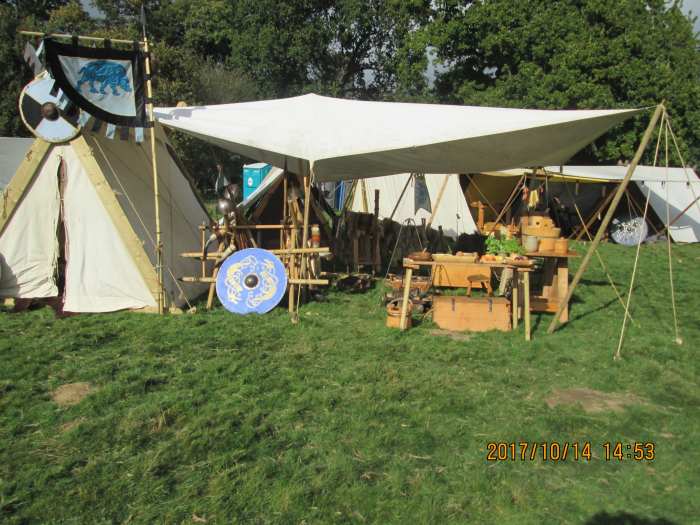 The 'Hildsvin' group's canvas stall with spare shield and spears ready for when there's a lull in the fighting. There was a break in fighting, called for by William and agreed by Harold, to see to the wounded, feed and water the horses and men
