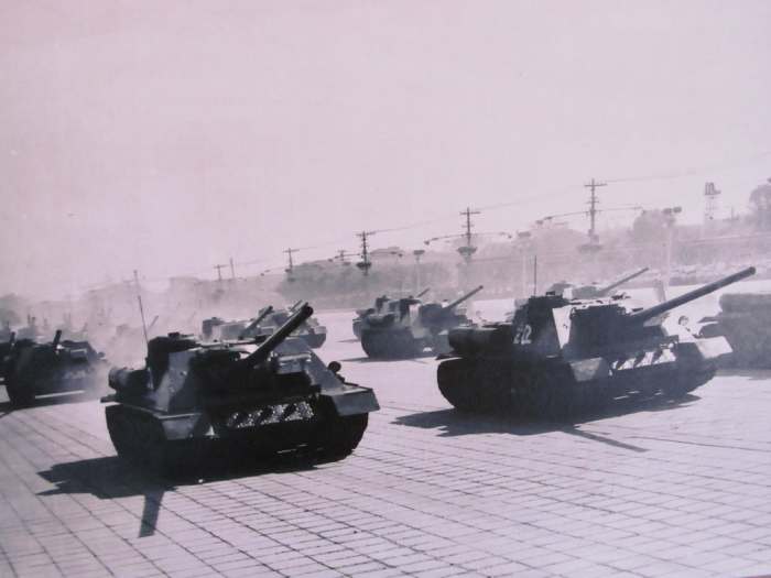 Chinese SU-100s on parade in the 1950s. Wargame Red Dragon's game mechanics make 1940s tank destroyers still relevant on a 1990s battlefield.
