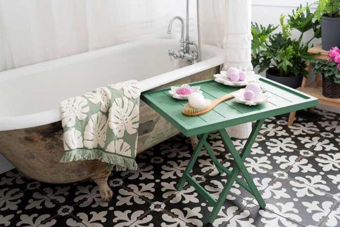 With standalone bathtub being all the rage lately, a small wooden tray is a great way to change up the ambiance of the bathroom.