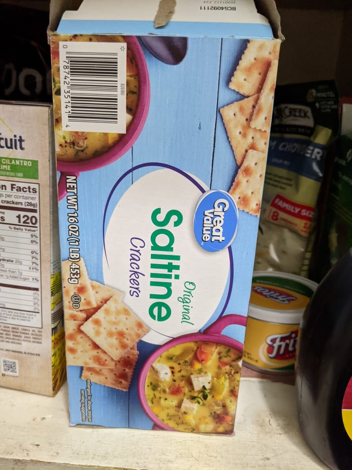 Saltine crackers, chopped fine in a food processor. Old method: crush with side of jar or rolling pin.
