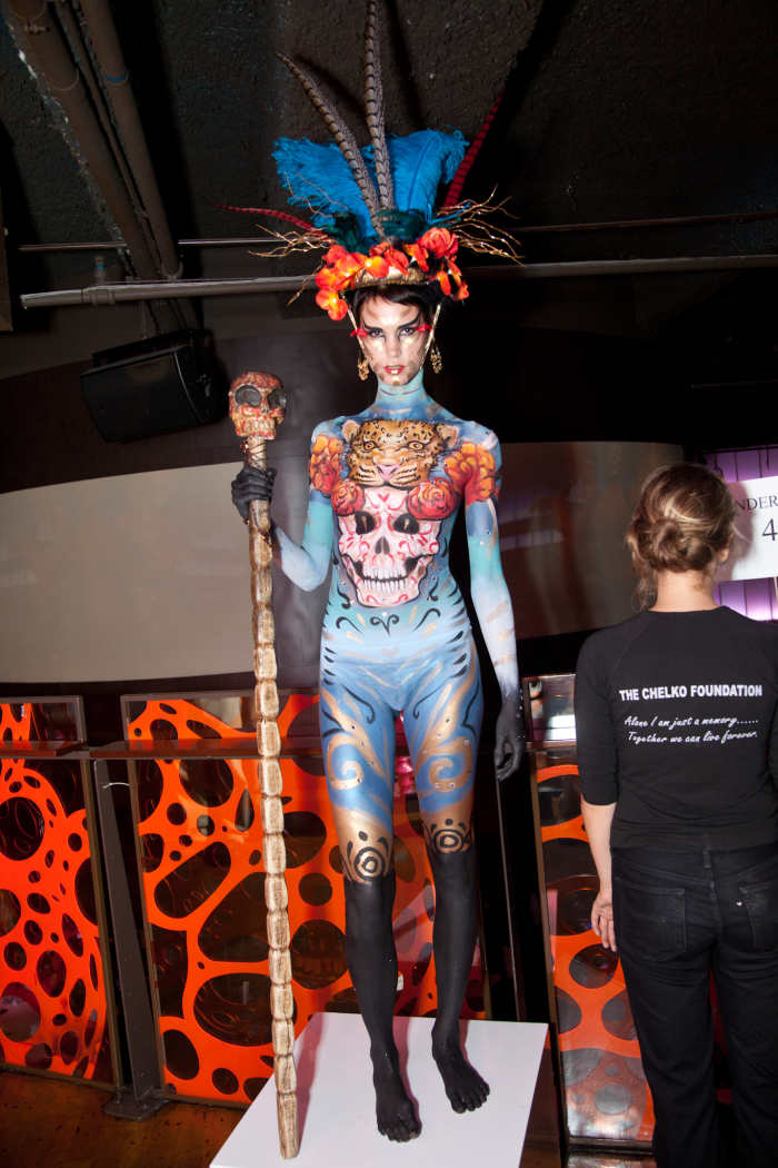 body painting may be introduced into art gallery openings with the waiters and waitresses painted in fake "clothing".