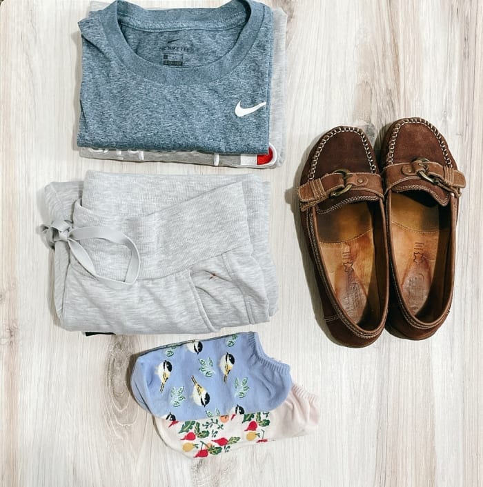 For a long-haul flight, I carry extra clean shirts and pants so I can change after 5–6 hours on the flight. As soon as I'm seated, I will change my sneakers to flat shoes or fresh socks.