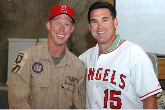 Tim Salmon (right) visits with troops overseas. The “Kingfish” was one of the most popular players in franchise history.