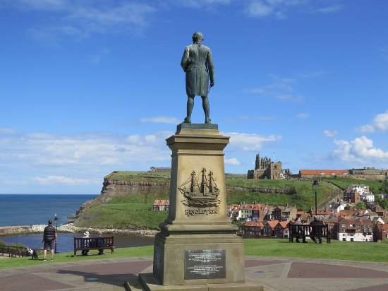 Captain James Cook RN, Fellow of the Royal Society by virtue of the role he played navigating his ships across relatively unknown seas. He gazes out from his plinth on Whitby Westcliff