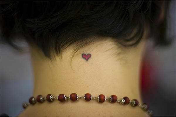 A tiny tattoo can be discreet, awesome and meaningful. Explore a few tiny designs, from hearts to ladybugs.