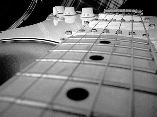 Close-up view of a Fender Stratocaster electric guitar with a maple fretboard. (Photo by Bill Bradford)