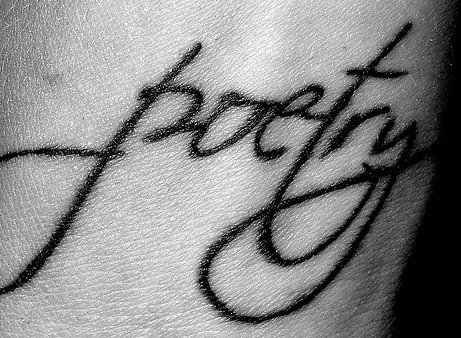 A tatoo of the word "poetry" symbolizes the closeness of the art to the poet's soul.