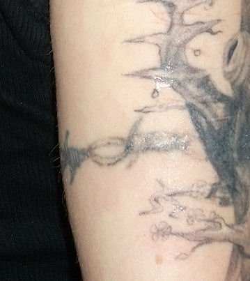 This is the first section of barbed wire I had done. It's only a few weeks after that session and look how light it is! There are still six more weeks of healing and lightening to go.