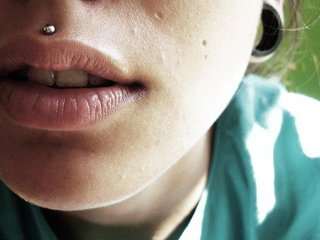 A medusa piercing is similar to a labret piercing but is positioned between the nose and the upper lip.