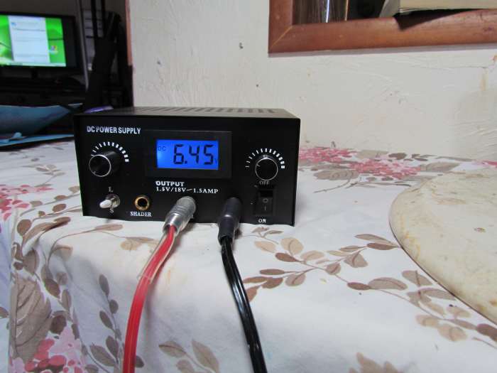 This is the power supply drawing an electrical current. Notice the digital display and the voltage my machine is pulling.