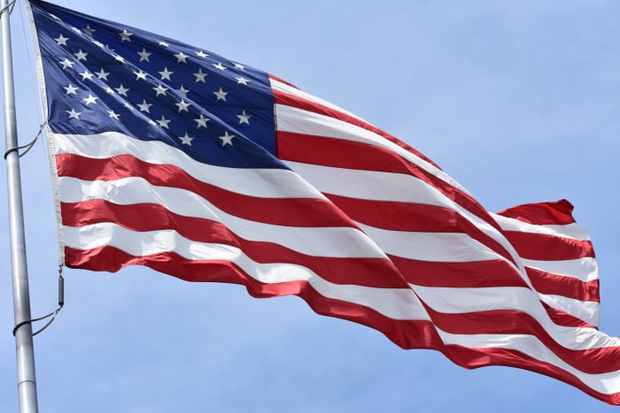 This Texas-sized flag was flapping in the breeze on the shores of the Mississippi River in MacGregor, Iowa.