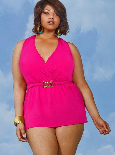 This halter plus size swim dress has sewn-in soft bra cups, power mesh lining throughout, and a detachable belt.