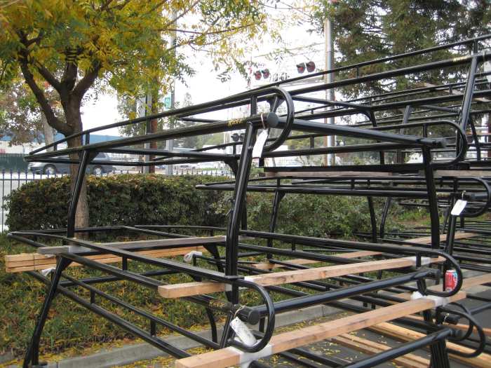 This is a stack of Rack-it brand standard lumber racks. They are one-piece welded racks with a removable rear bar.