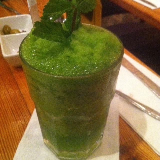 This green lemonade gets its color from mint, but green food coloring can do the trick as well.