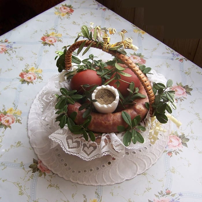 This is one type of Polish Easter Basket that is used to carry food to church for blessing on Easter Saturday. It has kielbasa, boiled eggs, salt, pepper and bread.
